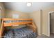 Functional ' bedroom featuring bunk beds, offering a comfortable and space-saving design at 4743 E Laurel Ave, Gilbert, AZ 85234