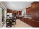 Traditional kitchen with stainless steel appliances and breakfast nook at 4743 E Laurel Ave, Gilbert, AZ 85234