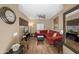 Comfortable living room with ceiling fan, modern decor and hardwood floors at 4743 E Laurel Ave, Gilbert, AZ 85234