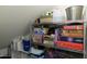 Organized storage space with shelves filled with household items, offering practical storage solutions at 4743 E Laurel Ave, Gilbert, AZ 85234