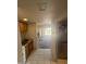 View from kitchen shows cabinetry, appliances, and connection to spacious living area at 4750 N Central Ave # 3S, Phoenix, AZ 85012