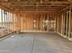 An interior view of new home construction, displaying the framing and layout of the property at 5512 W Piedmont Rd, Laveen, AZ 85339