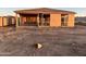 Home exterior displaying the framing of a new construction home with a foundation and a spacious garage at 5512 W Piedmont Rd, Laveen, AZ 85339