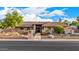Beautiful single-story home featuring desert landscaping and a tile roof at 5861 E Anderson Dr, Scottsdale, AZ 85254