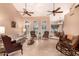 Spacious living room featuring vaulted ceilings and lots of seating at 5861 E Anderson Dr, Scottsdale, AZ 85254