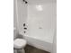 Clean bathroom features a toilet and shower-tub combination at 5975 N 48Th Dr, Glendale, AZ 85301