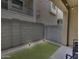 Private backyard featuring a seating area, turf, and decorative rock at 631 W Winchester Dr, Chandler, AZ 85286