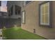 Low-maintenance backyard featuring artificial turf and privacy fencing at 631 W Winchester Dr, Chandler, AZ 85286