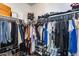 This closet maximizes storage with hanging rods, shoe racks, shelves, and drawers at 631 W Winchester Dr, Chandler, AZ 85286