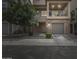 Inviting two-story home with a two-car garage, balcony, and well-manicured landscaping at 631 W Winchester Dr, Chandler, AZ 85286