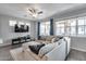 Comfortable living area with stylish furnishings, a large TV, and bright windows creating an inviting atmosphere at 631 W Winchester Dr, Chandler, AZ 85286