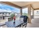 Inviting covered patio perfect for outdoor dining, featuring a table, chairs, and serene neighborhood views at 631 W Winchester Dr, Chandler, AZ 85286