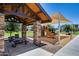 Community playground featuring a shaded picnic area and slide at 631 W Winchester Dr, Chandler, AZ 85286