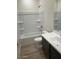 Bright bathroom featuring a tub and shower combination, a vanity, and a toilet at 640 S Maricopa Rd, Florence, AZ 85132