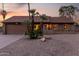Charming single-Gathering home boasting a landscaped front yard and attached two-car garage at 6424 E Aire Libre Ln, Scottsdale, AZ 85254