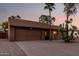 Charming single-Gathering home boasting a landscaped front yard and attached two-car garage at 6424 E Aire Libre Ln, Scottsdale, AZ 85254