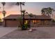 Charming single-Gathering home boasting a landscaped front yard and attached two-car garage at 6424 E Aire Libre Ln, Scottsdale, AZ 85254