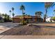 Charming single-story home with desert landscaping and a spacious two car garage at 6424 E Aire Libre Ln, Scottsdale, AZ 85254