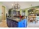 Island with granite countertops and gas cooktop, ideal for cooking and entertaining at 6428 W Eugie Ave, Glendale, AZ 85304
