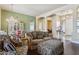 Spacious living room with hardwood floors and comfortable seating at 6428 W Eugie Ave, Glendale, AZ 85304
