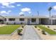 Charming home featuring a well-manicured front yard and a welcoming walkway at 6723 E 1St Ave, Scottsdale, AZ 85251