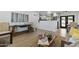 Open-concept living area with stylish furniture and contemporary decor at 6723 E 1St Ave, Scottsdale, AZ 85251