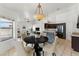 Dining area offering an open concept with views of the kitchen and living room at 719 W Milada Dr, Phoenix, AZ 85041