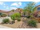 Charming single-Gathering home with well-manicured landscaping, a two-car garage, and a tile roof at 719 W Milada Dr, Phoenix, AZ 85041