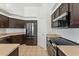 Modern kitchen featuring stainless steel appliances and ample cabinet space at 719 W Milada Dr, Phoenix, AZ 85041