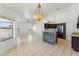 Bright and airy living space with an open floor plan to the kitchen and dining area at 719 W Milada Dr, Phoenix, AZ 85041