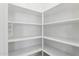 Walk-in pantry featuring ample shelving for food storage at 719 W Milada Dr, Phoenix, AZ 85041