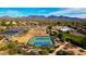 Gorgeous aerial view of the community's recreational facilities including tennis and basketball courts at 7527 E Nestling Way, Scottsdale, AZ 85255