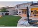 Sprawling backyard with a pool, basketball court, and beautifully landscaped patio area, perfect for outdoor living at 7527 E Nestling Way, Scottsdale, AZ 85255