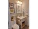 Cozy bathroom with neutral tones, decorative accents, and updated vanity at 7527 E Nestling Way, Scottsdale, AZ 85255