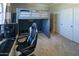 Bedroom featuring a bunk bed, gaming setup, and built-in storage at 7527 E Nestling Way, Scottsdale, AZ 85255