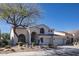 Lovely two-story home featuring desert landscaping, and a convenient three-car garage at 7527 E Nestling Way, Scottsdale, AZ 85255
