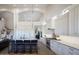 Spacious kitchen with ample cabinetry, stainless steel appliances, and island seating at 7527 E Nestling Way, Scottsdale, AZ 85255