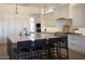 A chef's dream kitchen featuring granite countertops and ample storage space at 7527 E Nestling Way, Scottsdale, AZ 85255