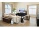 Bright living room with large windows, comfortable seating, and stylish decor at 7527 E Nestling Way, Scottsdale, AZ 85255