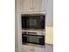 Modern stainless steel microwave and oven provide a complete cooking experience, ideal for any home chef at 7527 E Nestling Way, Scottsdale, AZ 85255