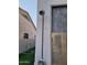 Handy outdoor shower on the side of the house near the pool and grassy area at 7527 E Nestling Way, Scottsdale, AZ 85255