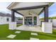 Charming covered back patio with cozy seating, ideal for relaxing and enjoying the outdoor space at 7851 N Central Ave, Phoenix, AZ 85020