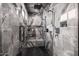 The glass shower includes elegant gray tile, shower bench, and modern fixtures at 7851 N Central Ave, Phoenix, AZ 85020