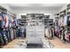 Spacious walk-in closet features custom shelving and ample storage space at 7851 N Central Ave, Phoenix, AZ 85020