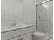 Bathroom features modern vanity, spacious shower with marble surround and glass door at 8000 W Griswold Rd, Peoria, AZ 85345