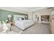 Serene bedroom features a plush bed, stylish accents, and ample space for a comfortable living experience at 8000 W Griswold Rd, Peoria, AZ 85345