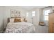 Cozy bedroom with neutral tones, playful animal-themed decor, and a plush teddy bear accent for a welcoming space at 8000 W Griswold Rd, Peoria, AZ 85345