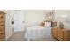 Inviting bedroom showcasing a comfortable bed, charming decor, and warm, neutral tones for a peaceful retreat at 8000 W Griswold Rd, Peoria, AZ 85345