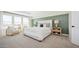 Spacious bedroom features a bed, lots of natural light, and stylish decor, for an inviting living space at 8000 W Griswold Rd, Peoria, AZ 85345