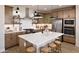 Modern kitchen featuring stainless steel appliances, a kitchen island, and pendant lighting over the island seating at 8000 W Griswold Rd, Peoria, AZ 85345